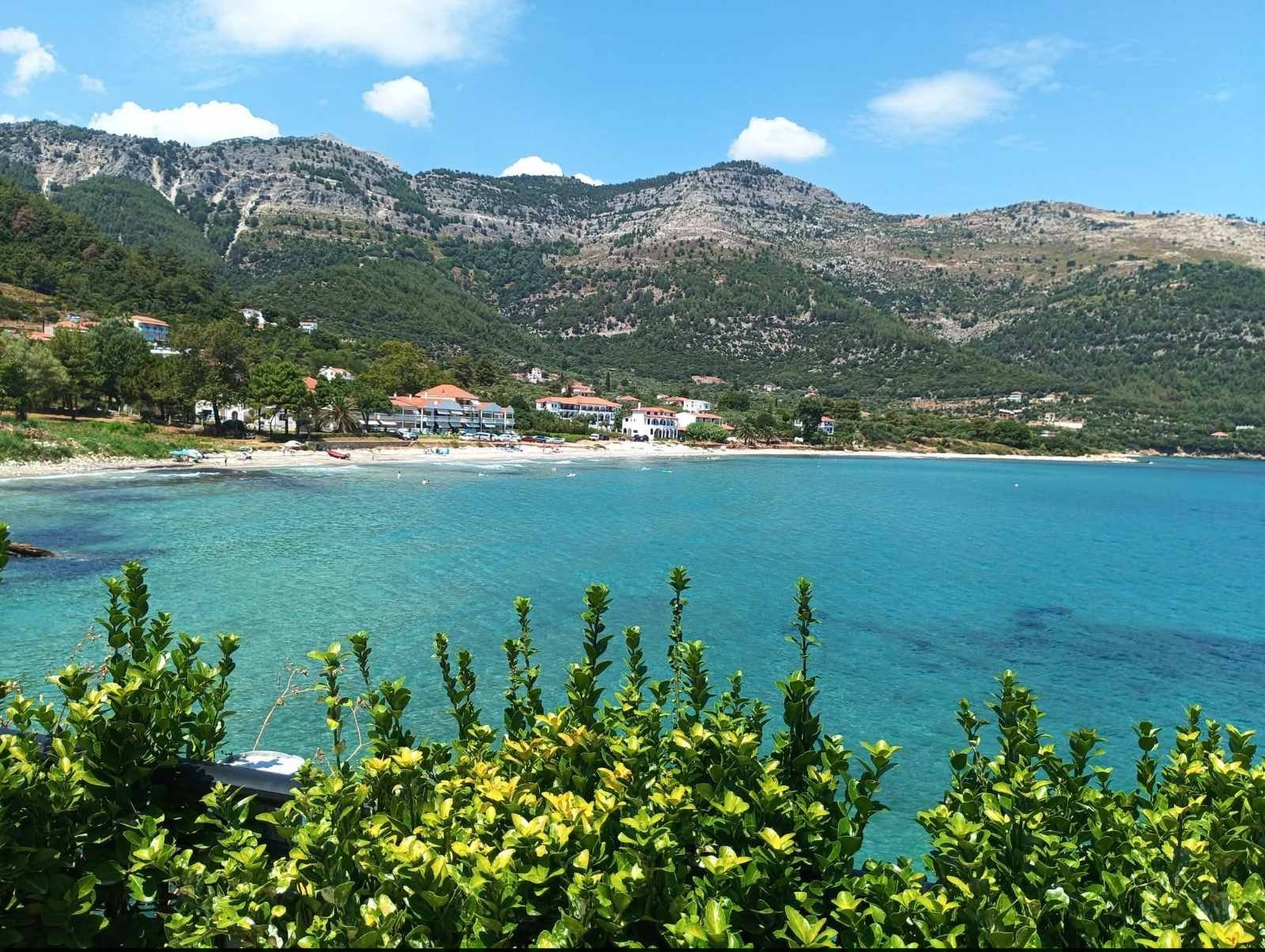 Kinira bay, village and mountains seen from above